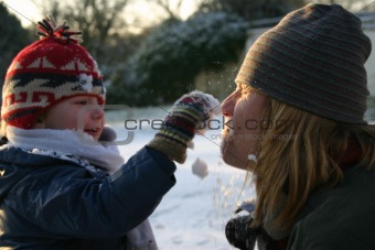 Mother and Son with Snow