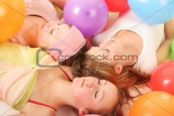 asleep amongst balloons