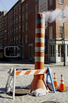 Steam venting from the street