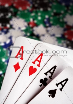 aces and  Casino Chips in background
