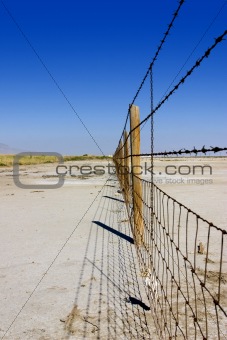Fence Under Clear Skies
