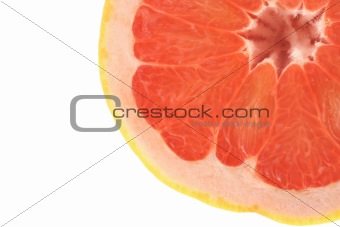 pat of a grapefruit on white