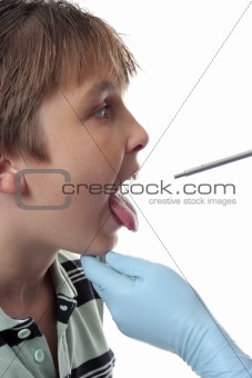Doctor looking inside mouth
