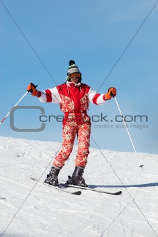 Happy ski girl in red