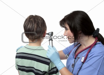 Doctor using otoscope