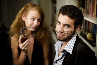 Woman looks lovingly at young man