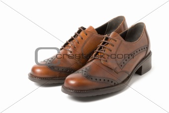 Two brown shoes isolated on white 