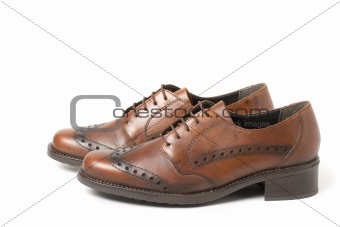 Two brown shoes isolated on white 