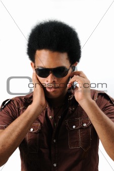 Latino man using cell phone