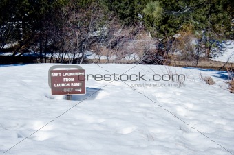 Snow Covered Sign