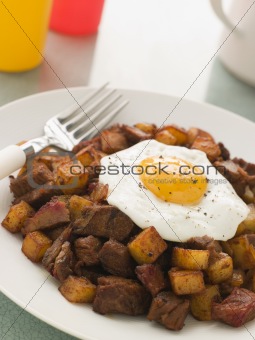 Corned Beef Hash With a Fried Egg and Black Pepper