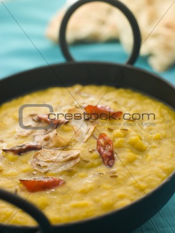 Karai Dish of Tarka Dhal with Naan Bread