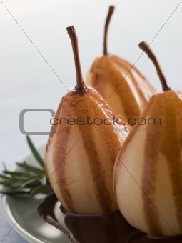 Pear Poached with Rosemary and a Chocolate sauce
