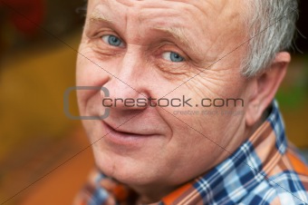 Casual bald senior man emotional portrait series.