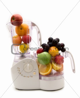 kitchen machine and fruits on white background