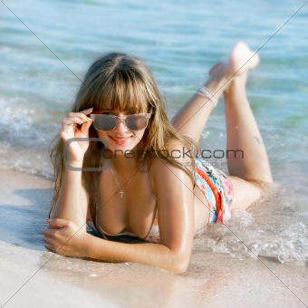 beautiful girl on sand beach