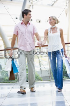 Young couple shopping in mall