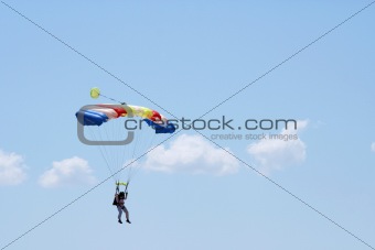 Parachuter and clouds