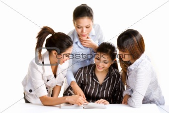 group of asian business women discussing work