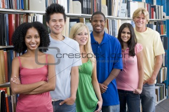 Group of university students in library