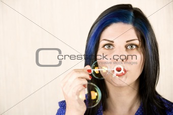 Pretty Woman Blowing Bubbles