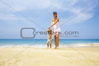 with  baby on beach