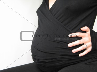 belly of a pregnant young woman