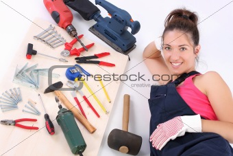 woman carpenter with work tools 