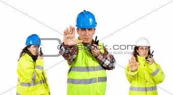 Construction workers talking with a walkie talkie