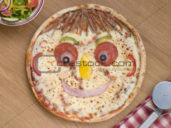 Smiley Faced Pizza with a Side Salad