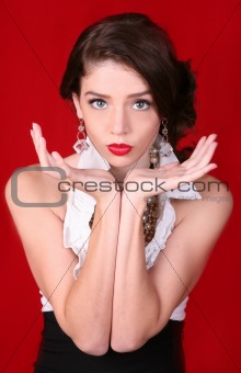 Beautiful High Fashion Woman on Red Background