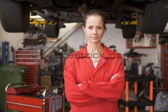 Mechanic standing in garage