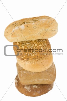 assortment of baked buns on white background