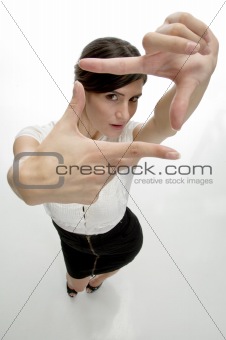 lady showing framing hand gesture