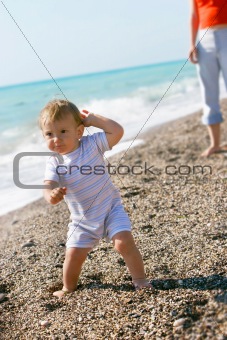 baby boy on beach