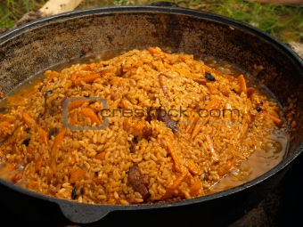 outdoor picnic pilau on the fire    