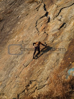 climber on the orange rock  