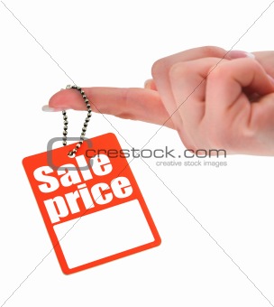 hand holding price tag