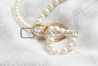 Wedding background: pearls and wedding bangs.