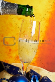 Pouring champagne on glass