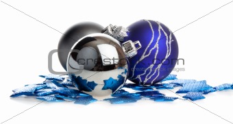 Christmas balls lying on blue stars