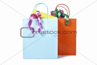 Two shopping bags with gifts inside