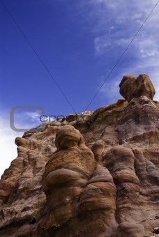 Red rocks against a blue sky