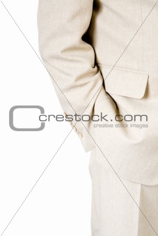 A business man with a hand in his pocket
