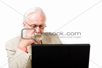 A business man concentrating on his computer