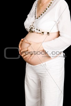 A pregnant lady holding her tummy