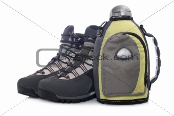 Hiking boots and canteen