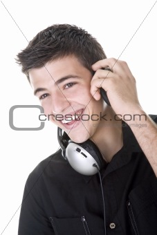 Young man, enjoying music with headphones. Isolated on white.