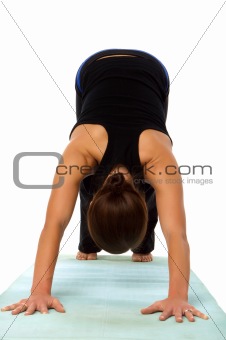 Young woman doing yoga excercises