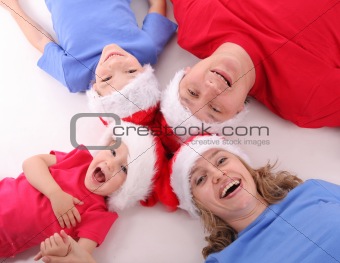 Happy family in Christmas hats 5